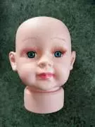 testa bambola 